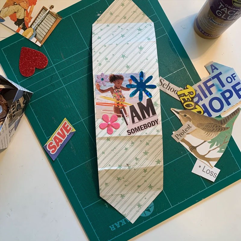 Collaging a Soul Box with scraps from magazines and books