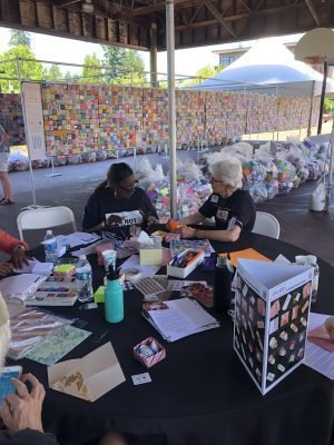 Volunteers putting together exhibits for Portland Event June 2021