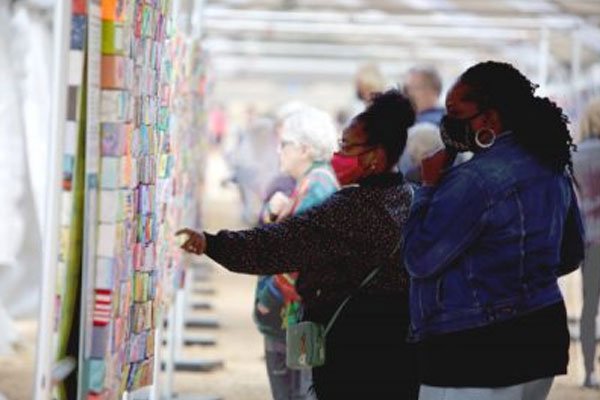 DC-Two-Ladies-Viewing-Panels-Donate-Page